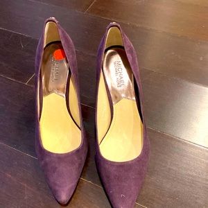 Plum suede pumps